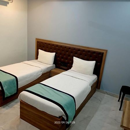 Vian Inn Гувахати Экстерьер фото